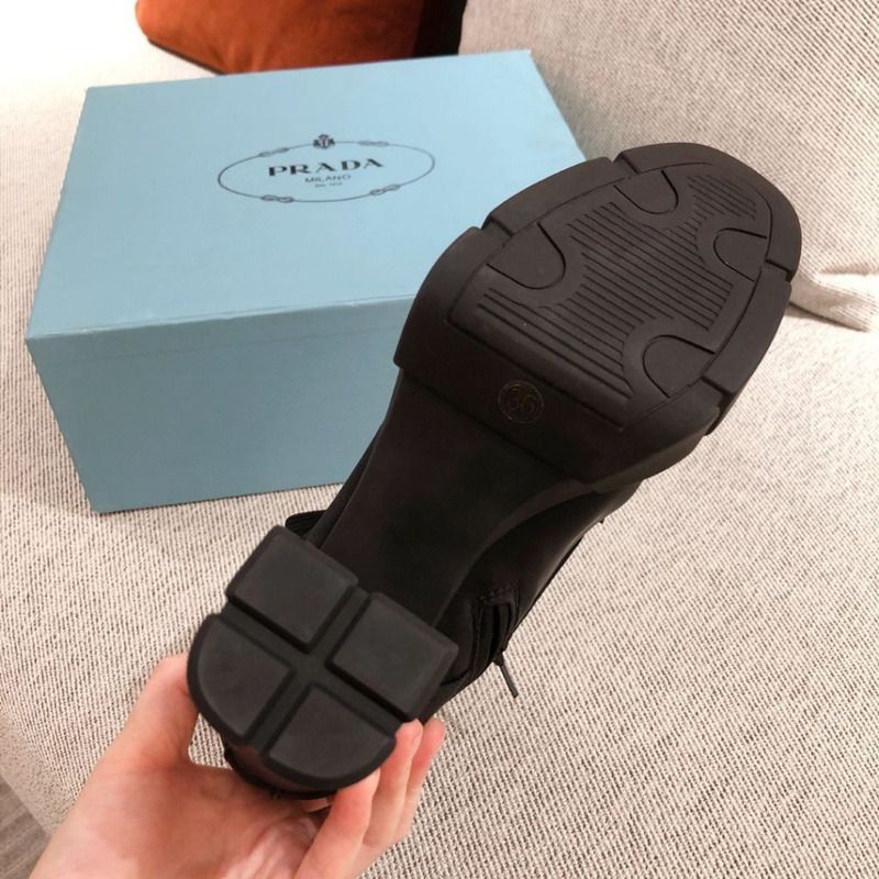 Pra*a black high boots