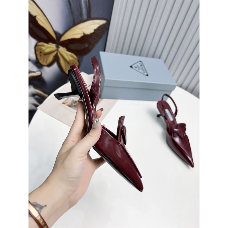 Pra*a logo patent leather pointy toe mule in wine