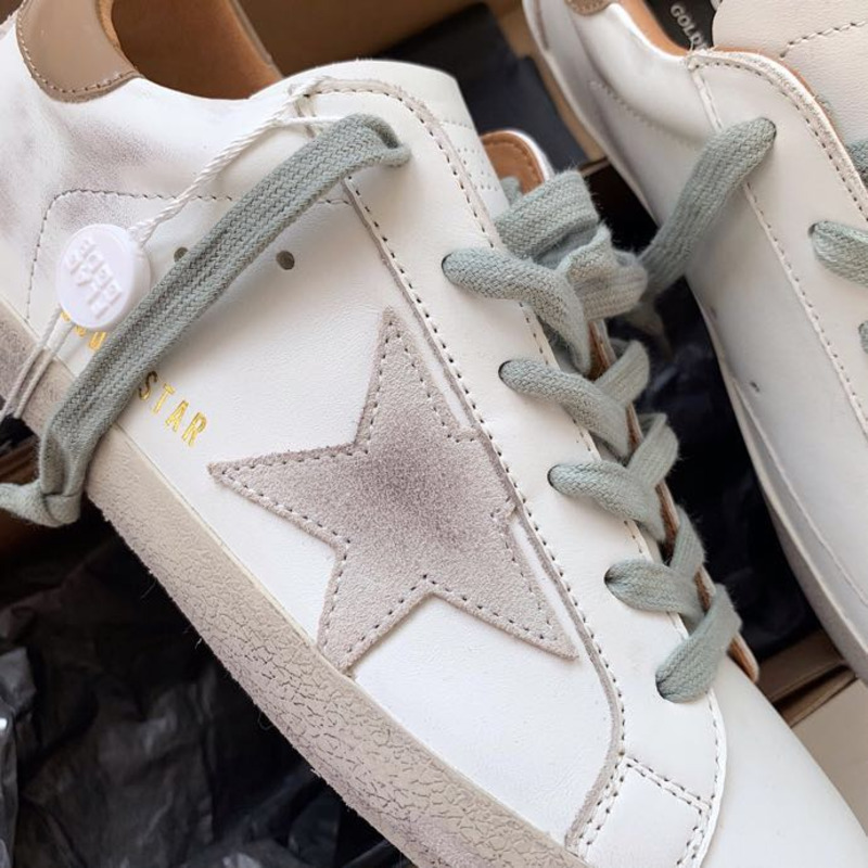 golden goose men’s S*per-star sneakers with suede star and brown heel tab