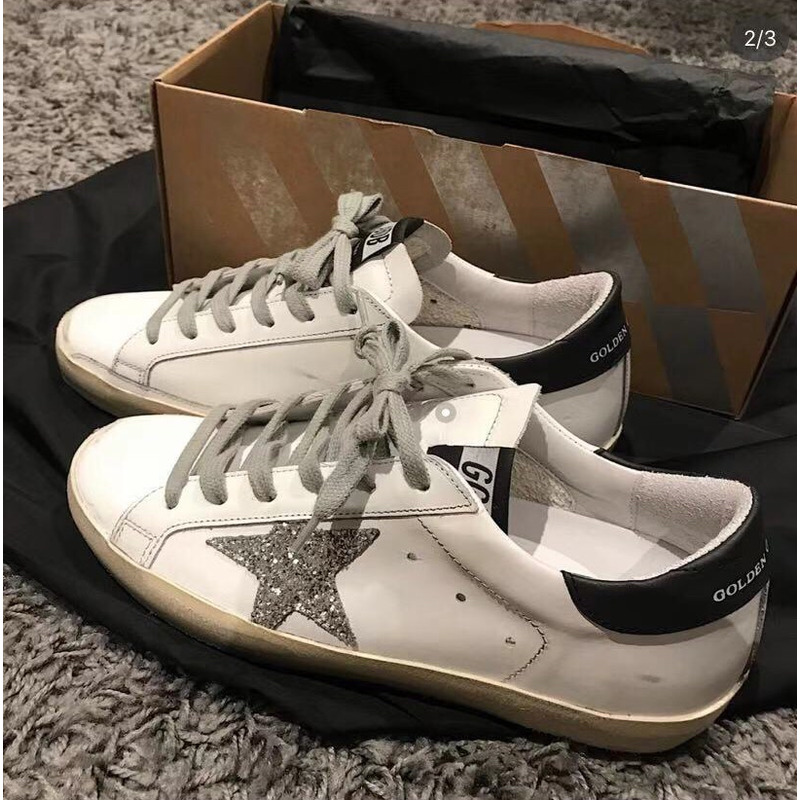 golden goose men’s S*per-star sneakers with silver star and black heel tab