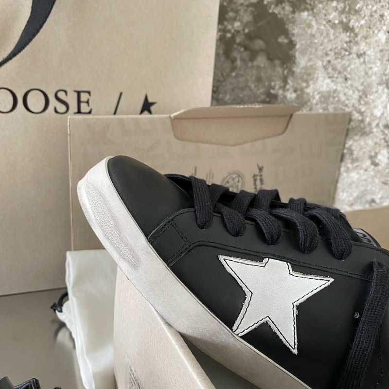 golden goose black S*per-star sneakers in leather with white star