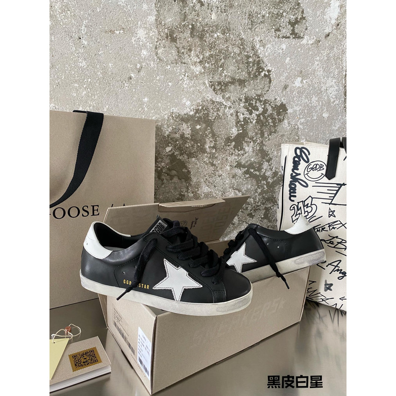 golden goose black S*per-star sneakers in leather with white star