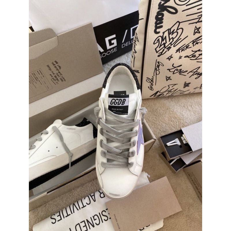 golden goose S*per-star sneakers with purple star logo and black heel tab