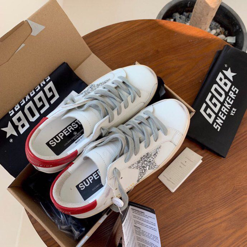 golden goose S*per-star sneakers with sliver glitter and red heel tab