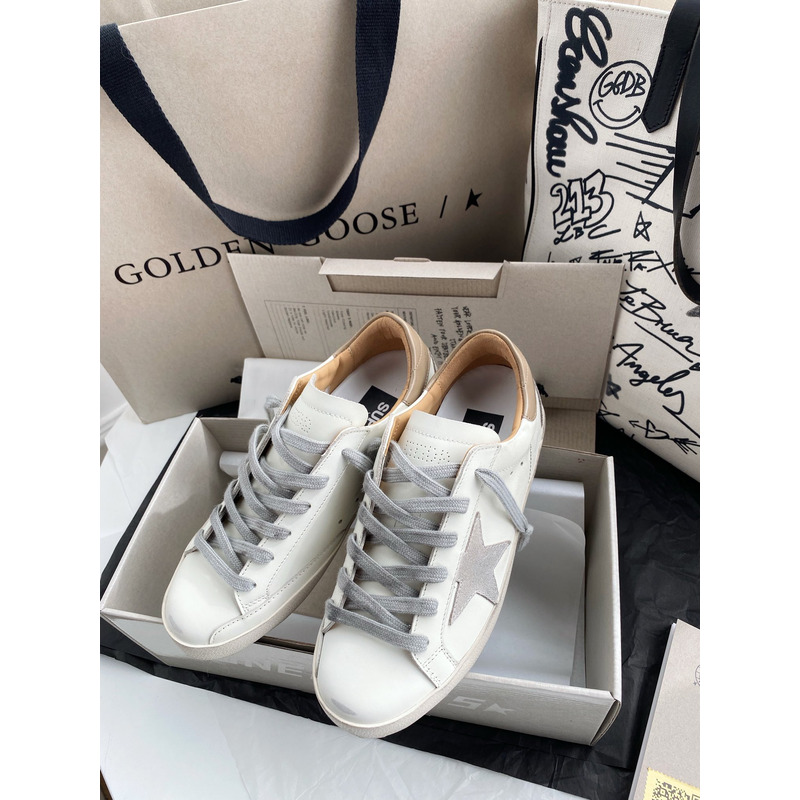 golden goose men’s S*per-star sneakers with suede star and camel heel tab