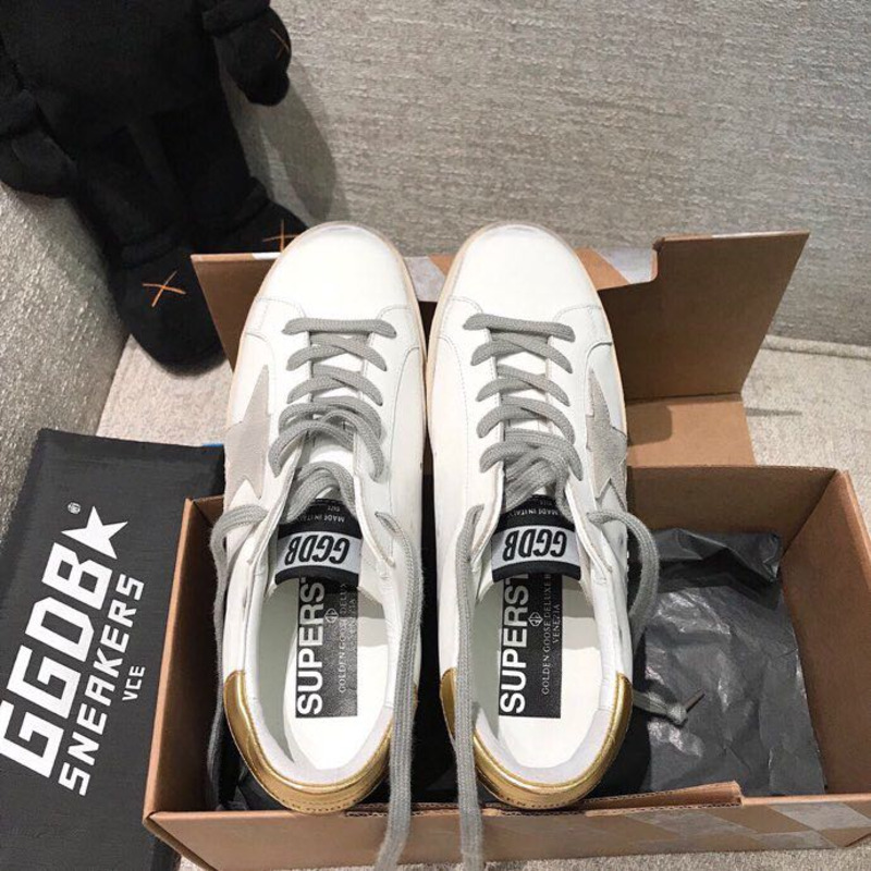 golden goose men’s S*per-star sneakers with suede star and golden heel tab