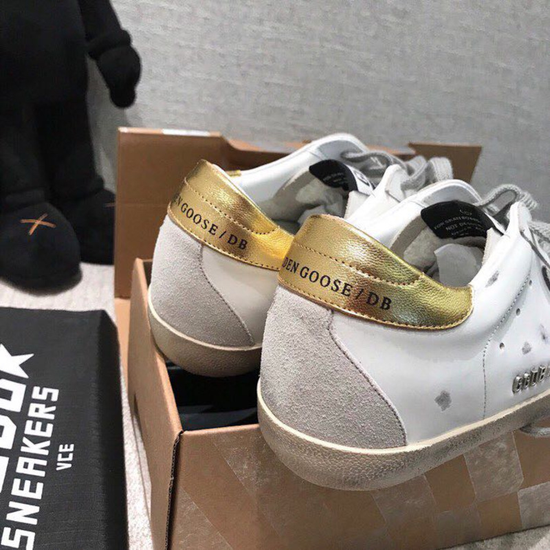 golden goose men’s S*per-star sneakers with suede star and golden heel tab