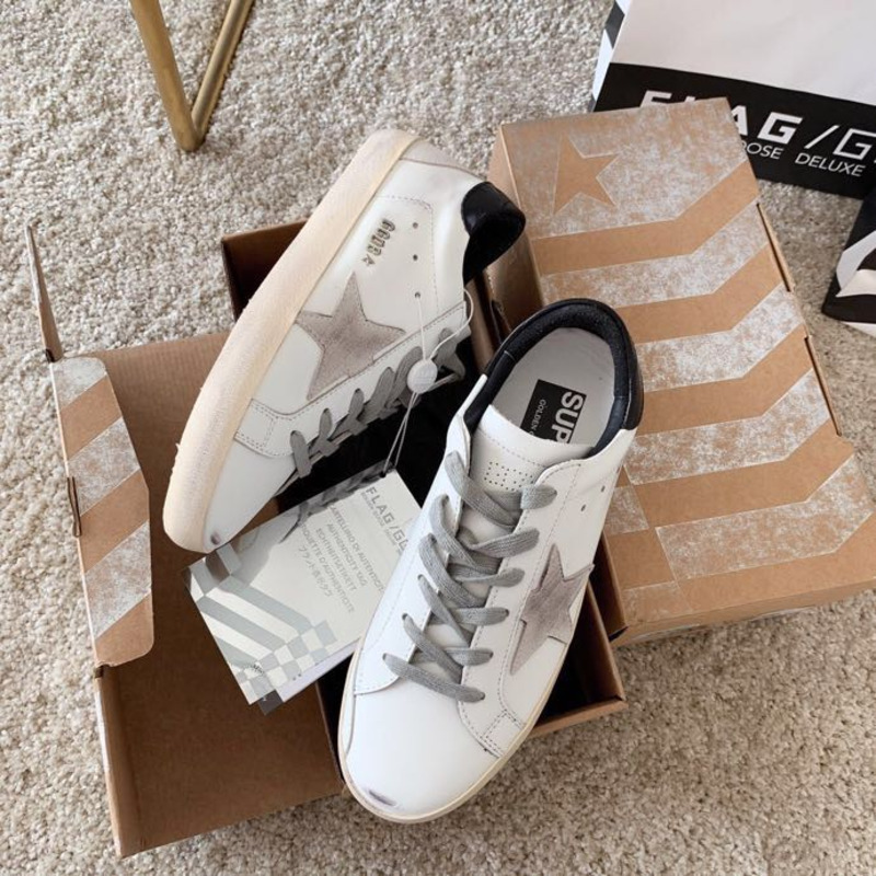 golden goose men’s S*per-star sneakers with suede star and black heel tab