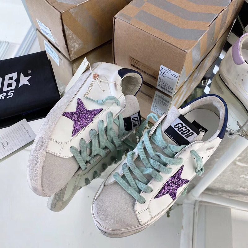 golden goose S*per-star sneakers with purple glitter and blue heel tab