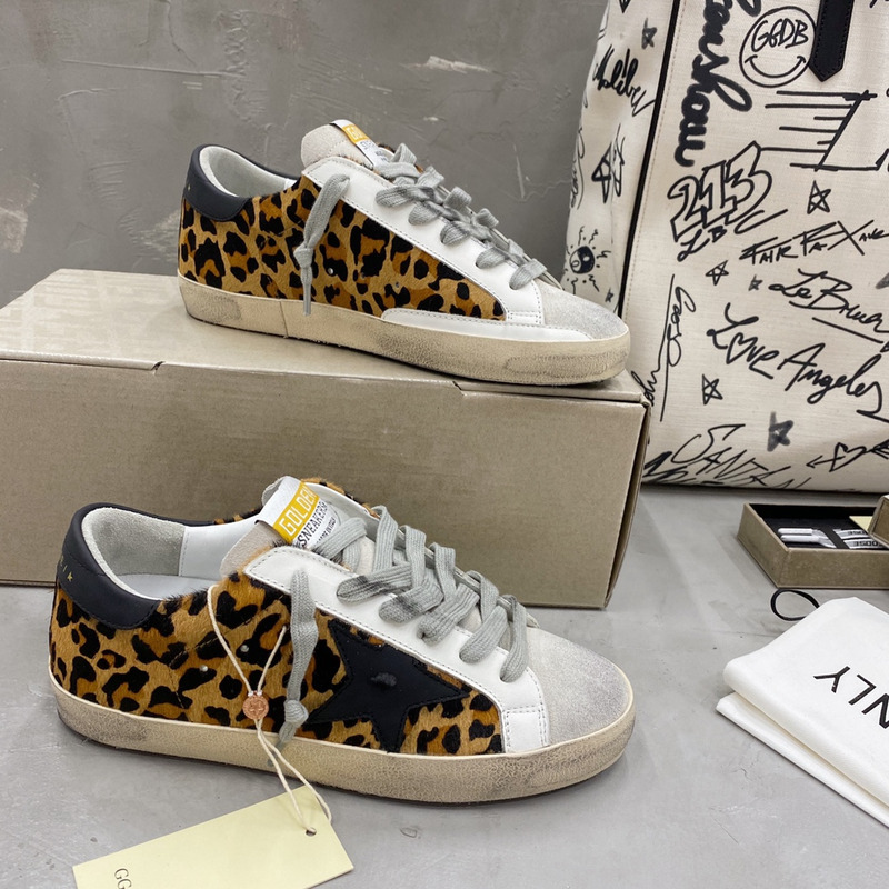 golden goose S*per-star sneakers with leopard print and black heel tab