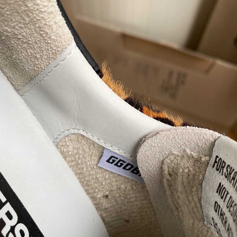 golden goose S*per-star sneakers with leopard print and black heel tab