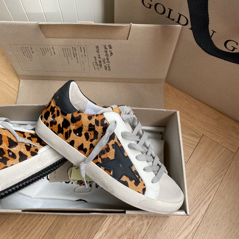 golden goose S*per-star sneakers with leopard print and black heel tab