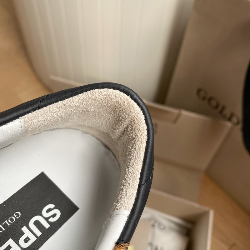 golden goose S*per-star sneakers with leopard print and black heel tab