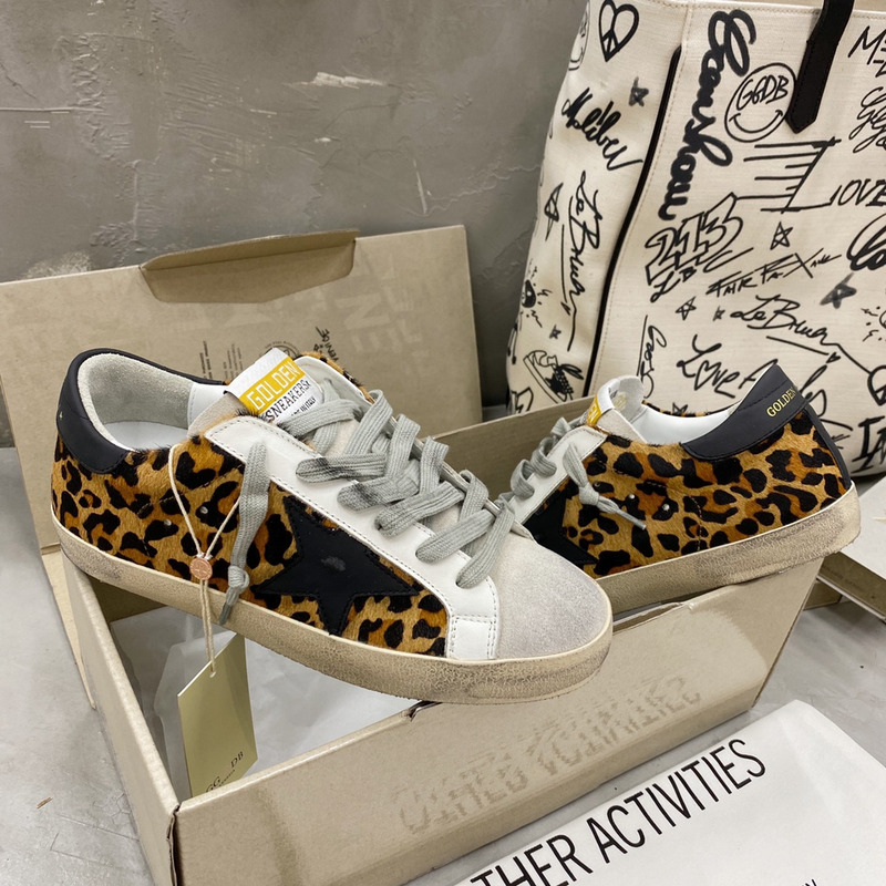 golden goose S*per-star sneakers with leopard print and black heel tab