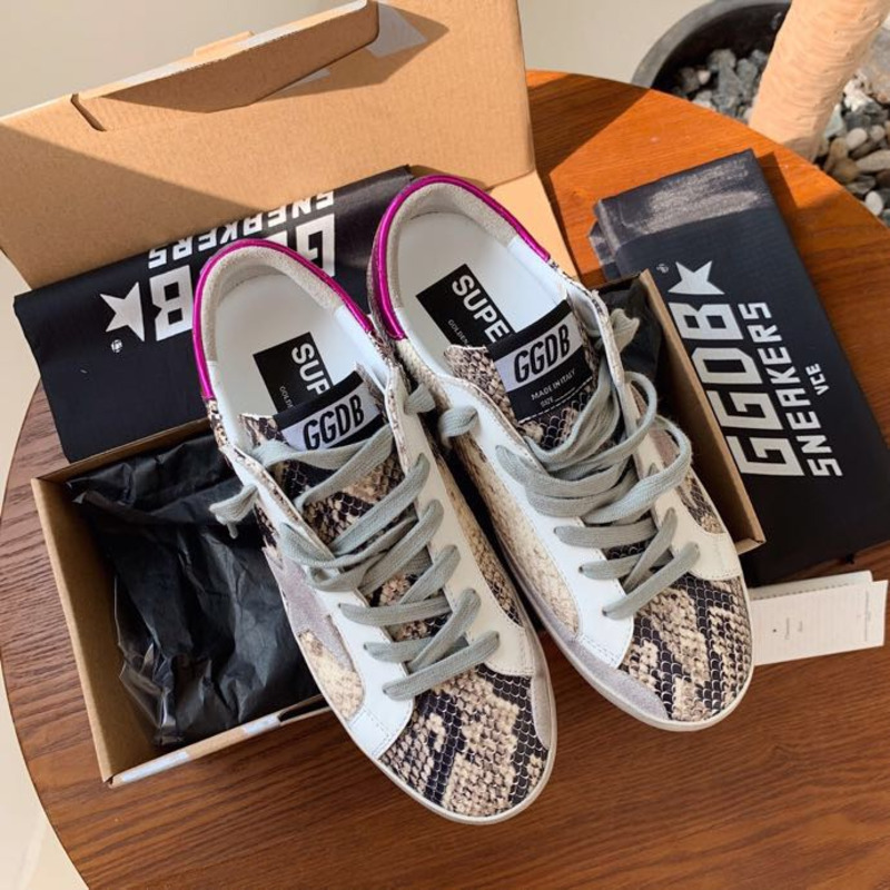 golden goose S*per-star sneakers with serpentine and purple heel tab
