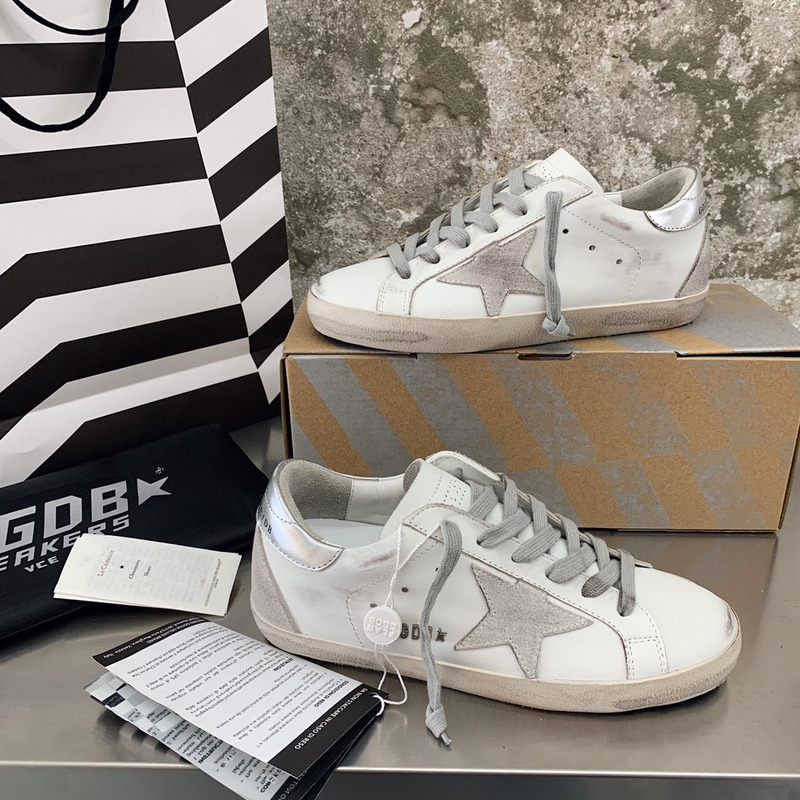 golden goose men’s S*per-star sneakers with suede star and sliver heel tab