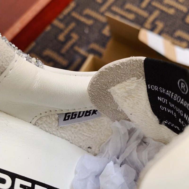 golden goose men’s S*per-star sneakers with suede star and sliver glitterheel tab