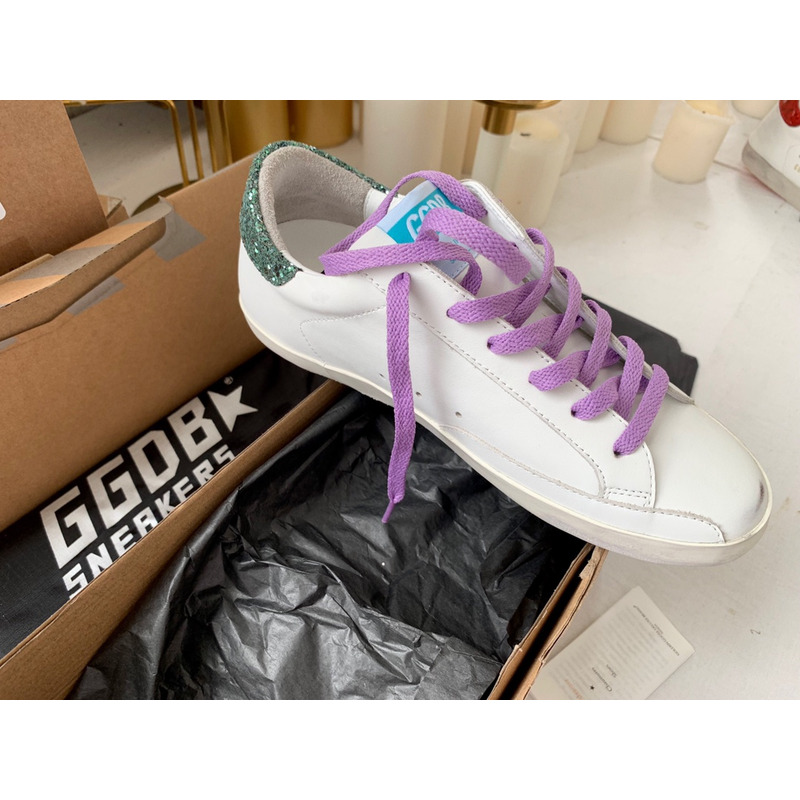 golden goose S*per-star sneakers with star and green glitter heel tab
