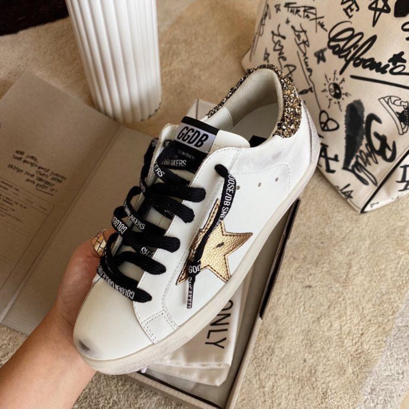 golden goose men’s S*per-star sneakers with brown suede star and glitter heel tab