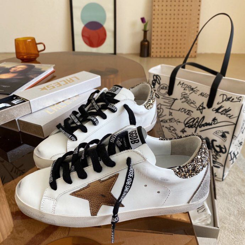 golden goose men’s S*per-star sneakers with brown suede star and glitter heel tab