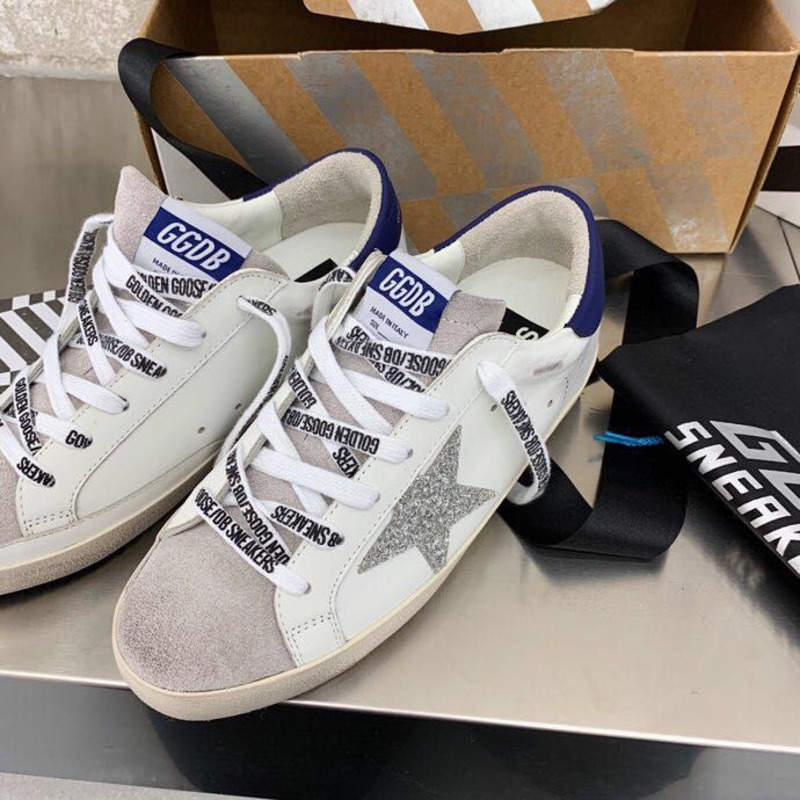 golden goose men’s S*per-star sneakers with sliver glitter star and blue heel tab