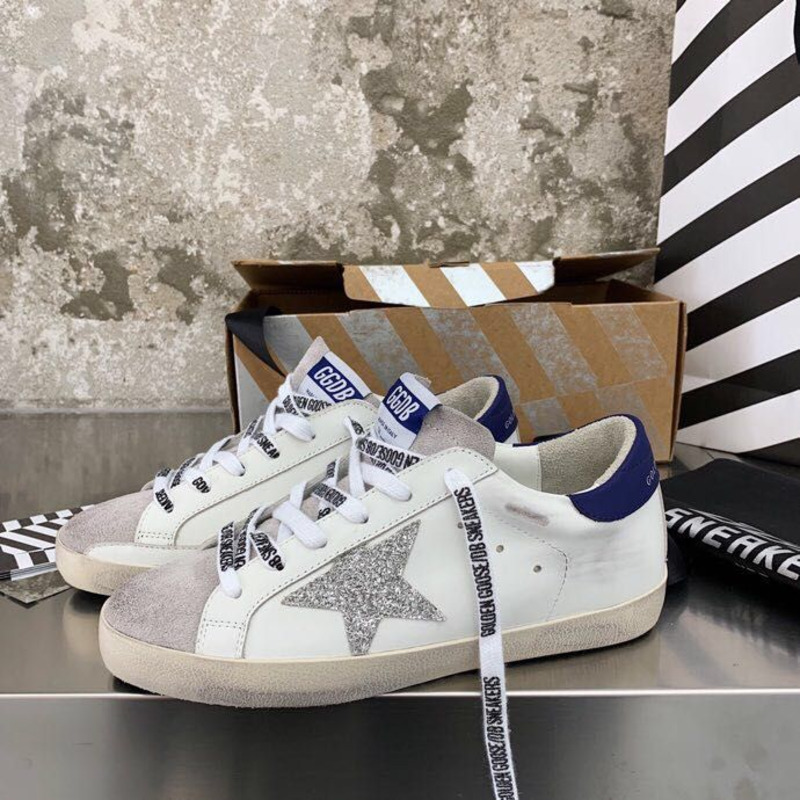 golden goose men’s S*per-star sneakers with sliver glitter star and blue heel tab