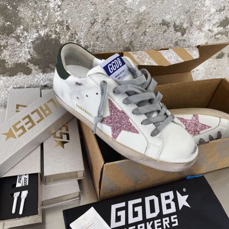 golden goose men’s S*per-star sneakers with pink glitter star and green heel tab