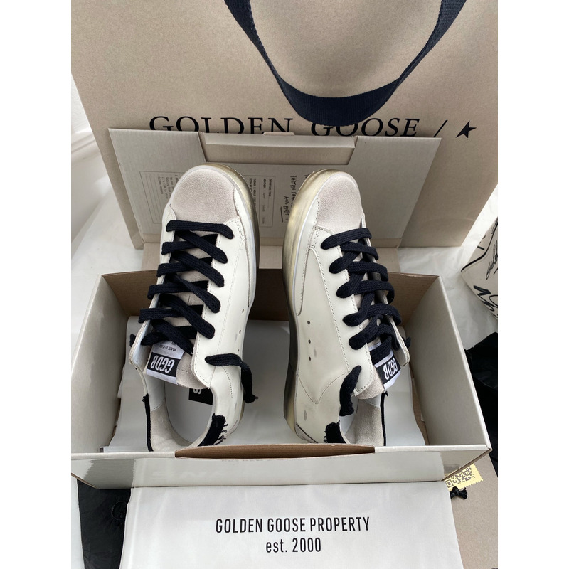 golden goose men’s S*per-star sneakers with black suede star and black heel tab