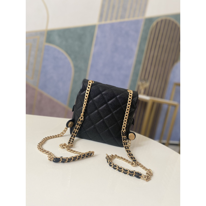 Ch*el grained calfskin & gold-tone metal backpack black