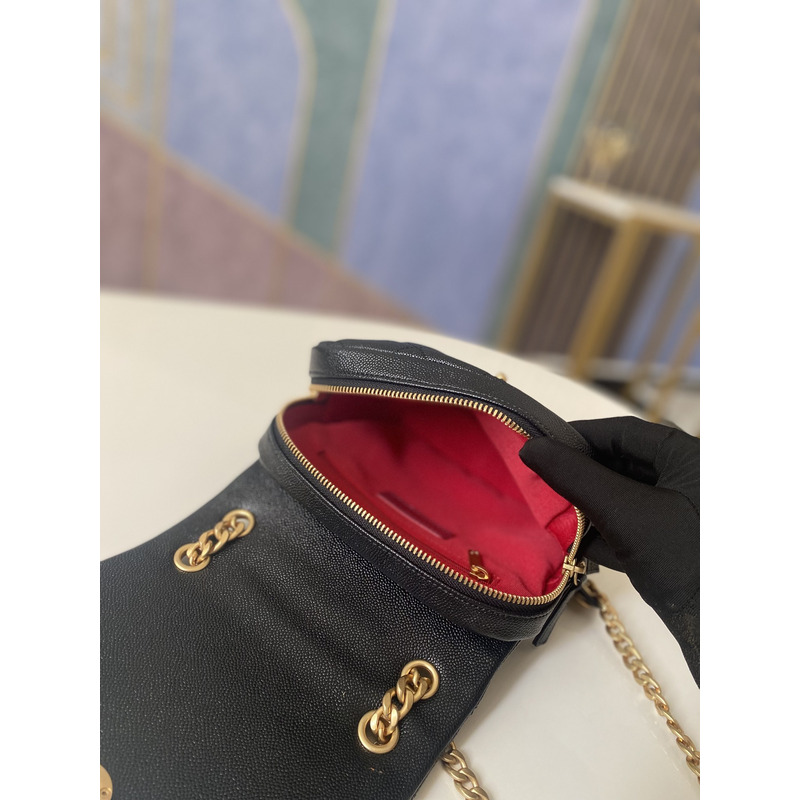 Ch*el grained calfskin & gold-tone metal backpack black