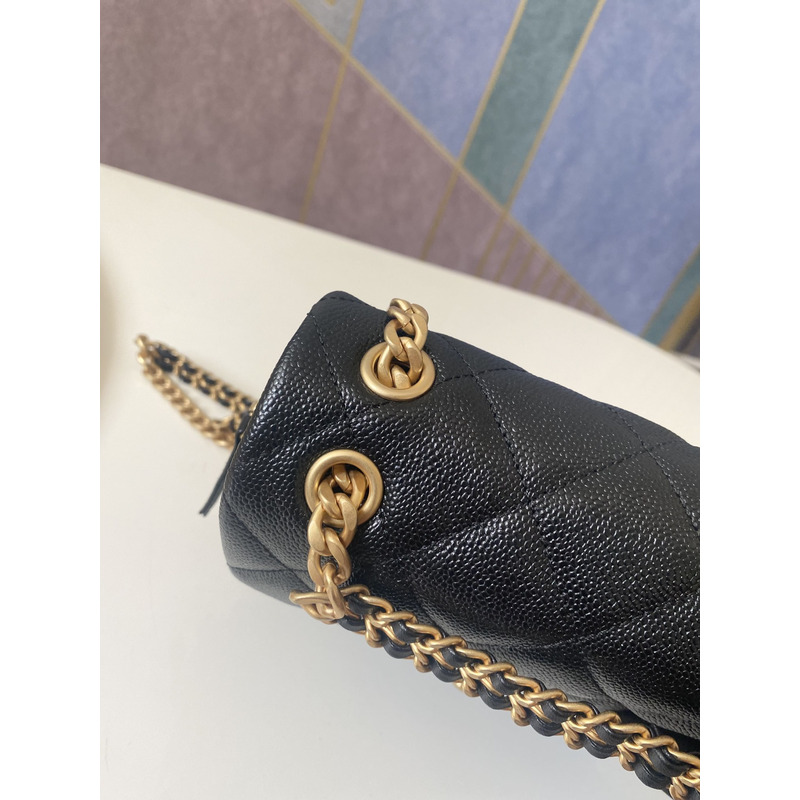 Ch*el grained calfskin & gold-tone metal backpack black