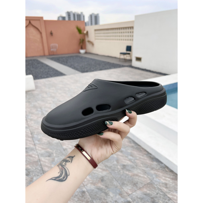 Pra*a foam rubber mules slides black