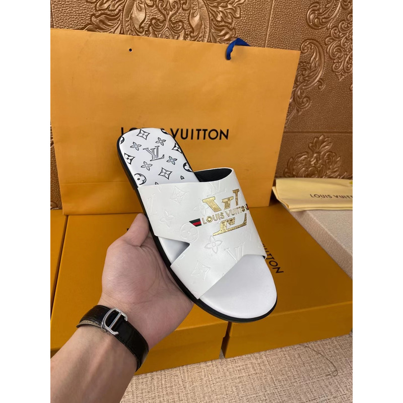 l**is V*t*n gold logo mules white