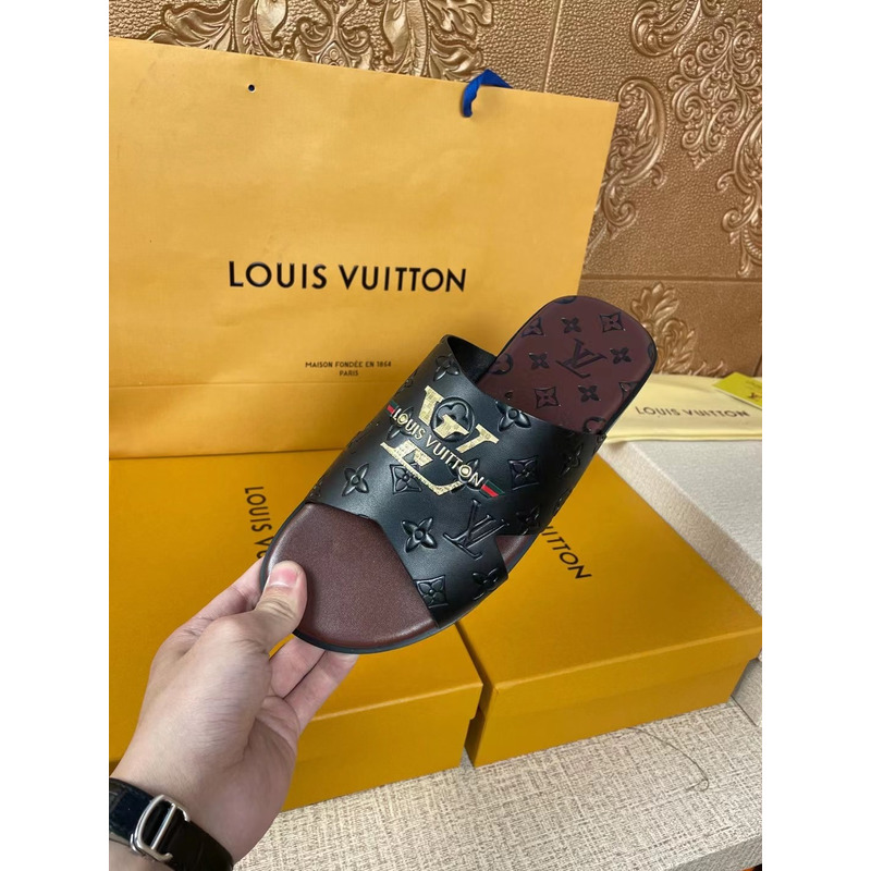 l**is V*t*n gold logo embossed monogram mules black/brown