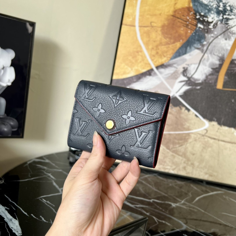 LV Embossed Zoe Short Wallet Leather Blue