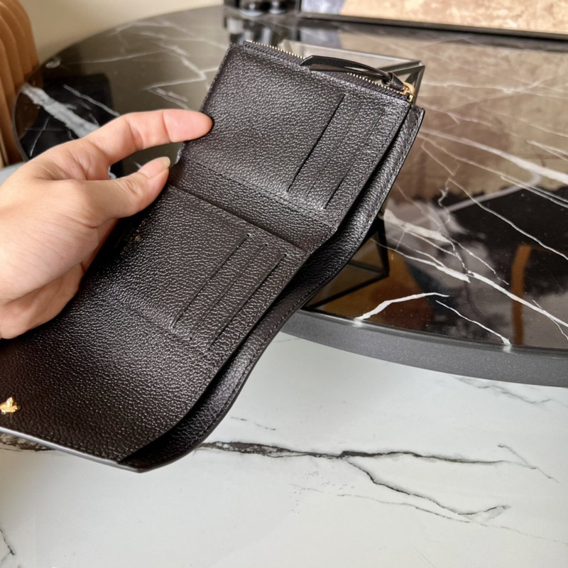 LV Embossed Zoe Short Wallet Leather Black