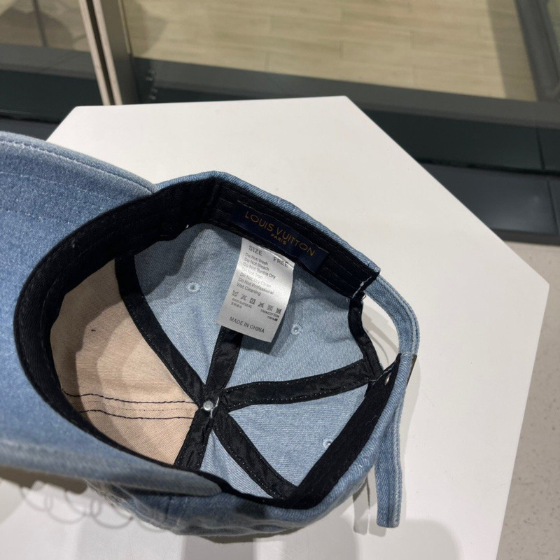 l**is V*t*n metal logo ripped hat blue denim