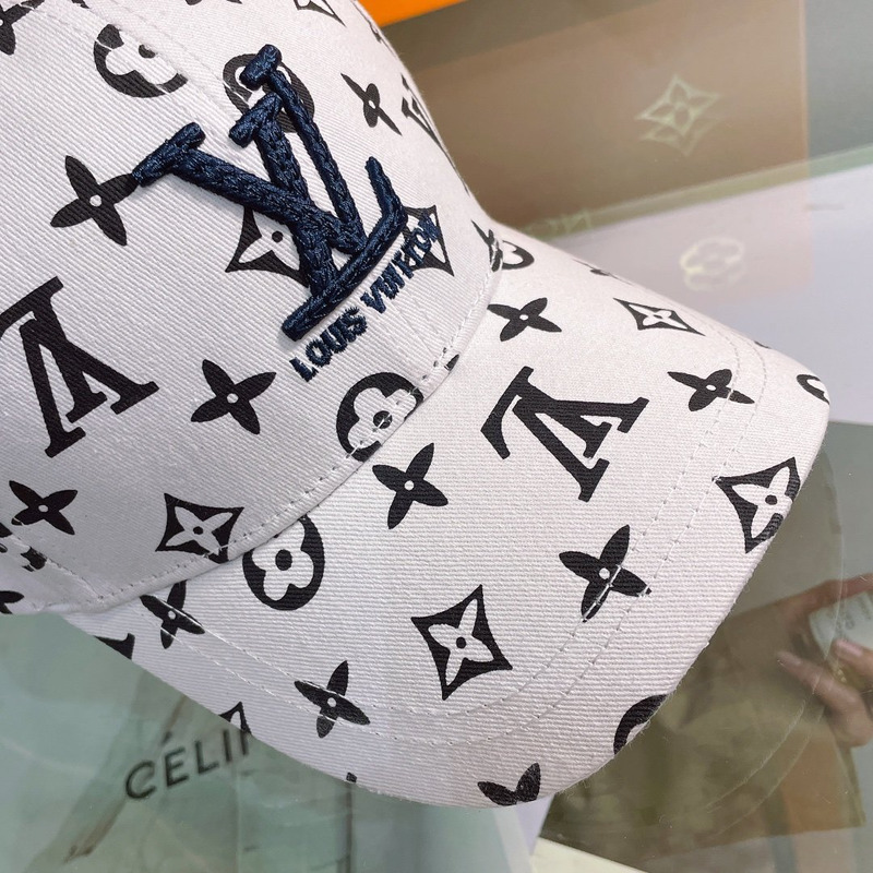 l**is V*t*n embroidered logo hat white
