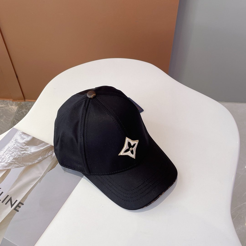 l**is V*t*n embroidered logo hat black