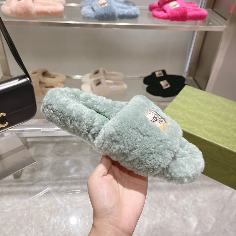 g*u*i x the n0*h F**e shearling slides green