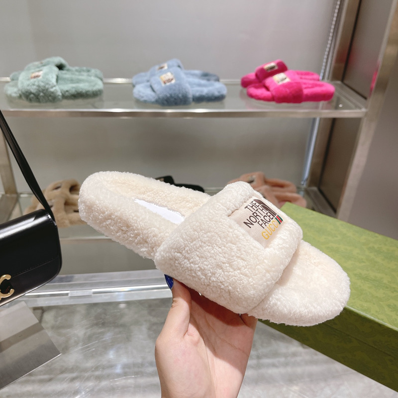 g*u*i x the n0*h F**e shearling slides white