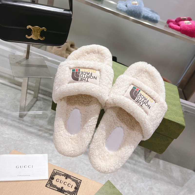 g*u*i x the n0*h F**e shearling slides white