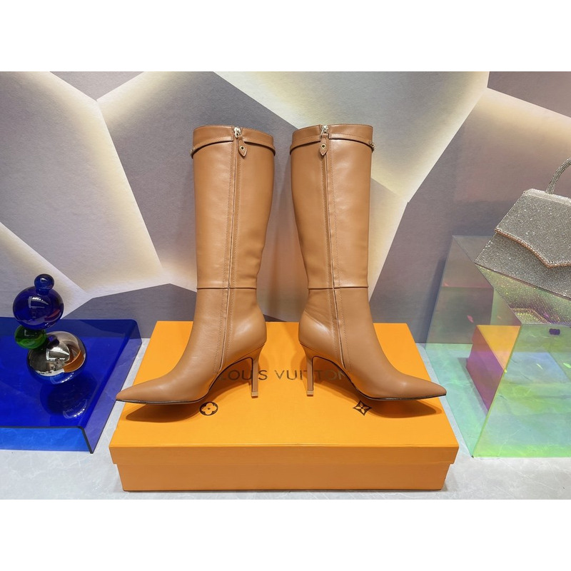 l**is V*t*n women’s signature high boots brown