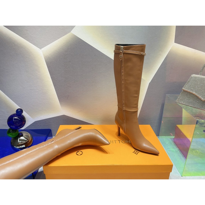 l**is V*t*n women’s signature high boots brown