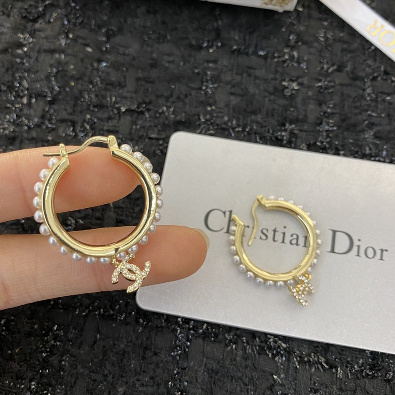 Ch*el pearl stud in rose gold