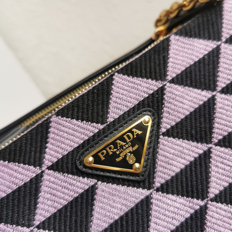 Pra*a symbole leather and fabric mini bag in black