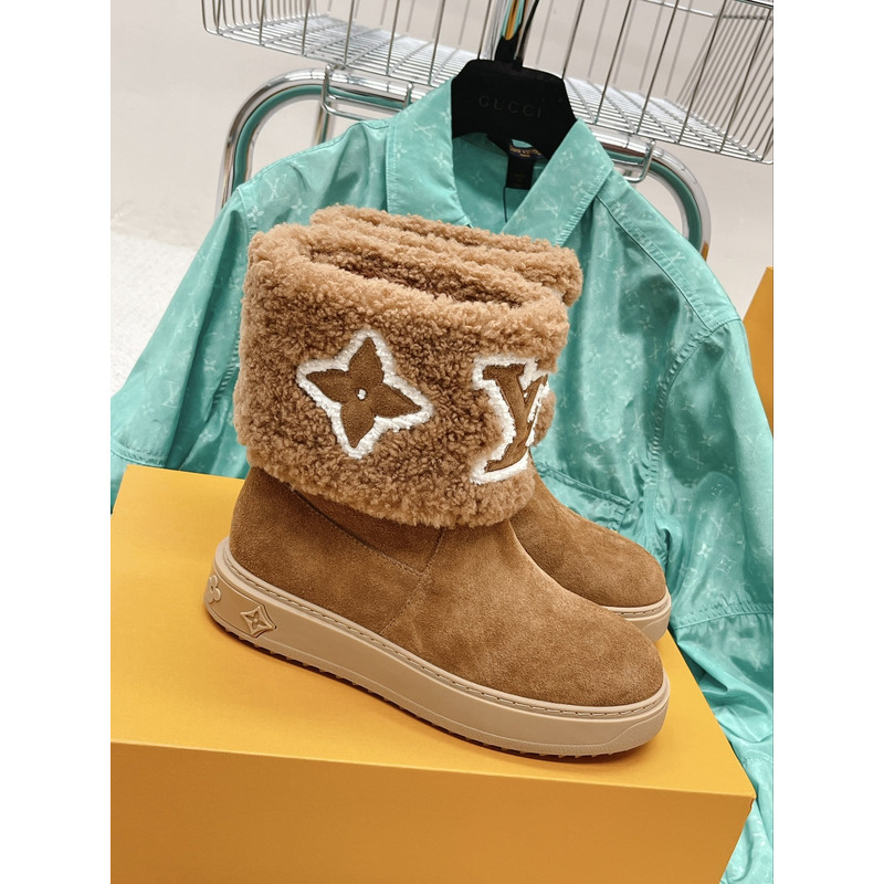 l**is V*t*n snowdrop flat ankle boots cognac