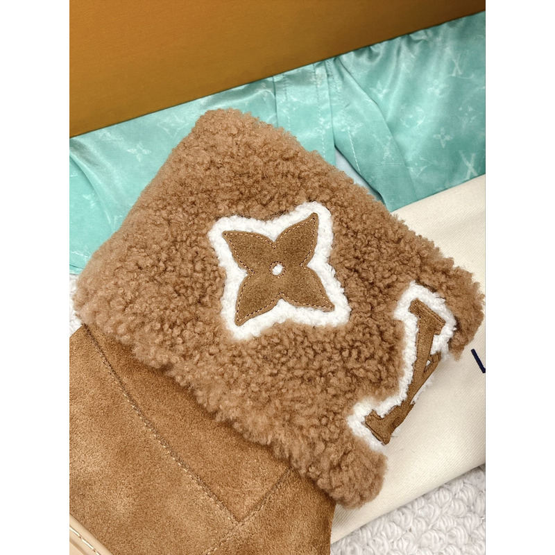 l**is V*t*n snowdrop flat ankle boots cognac