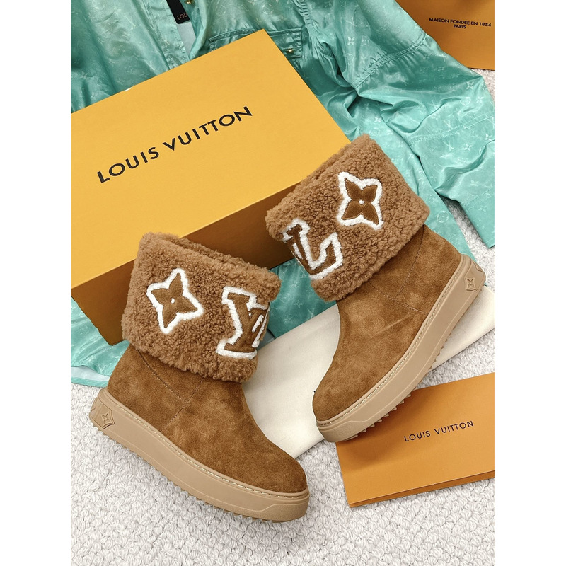 l**is V*t*n snowdrop flat ankle boots cognac