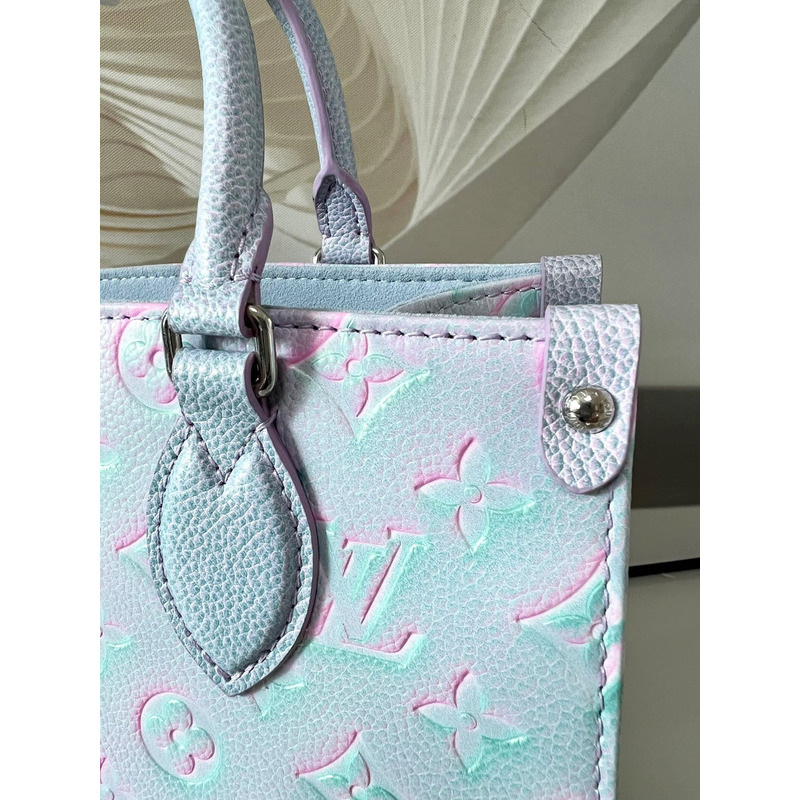 l**is V*t*n green, and blue summer stardust onthego pm silver hardware